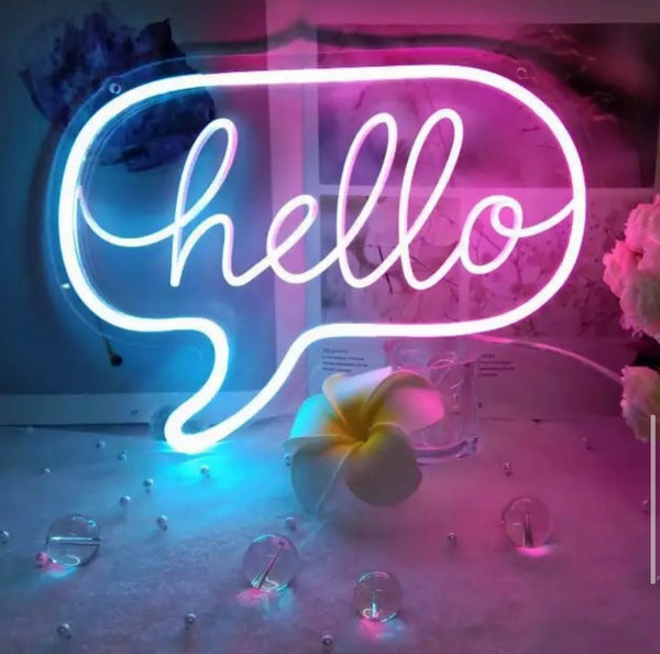 Neon pink and blue “ Hello” sign